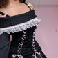 Side view of a Kawaii Coquette Off Shoulder Ribbon Sweater modeled by a woman in black