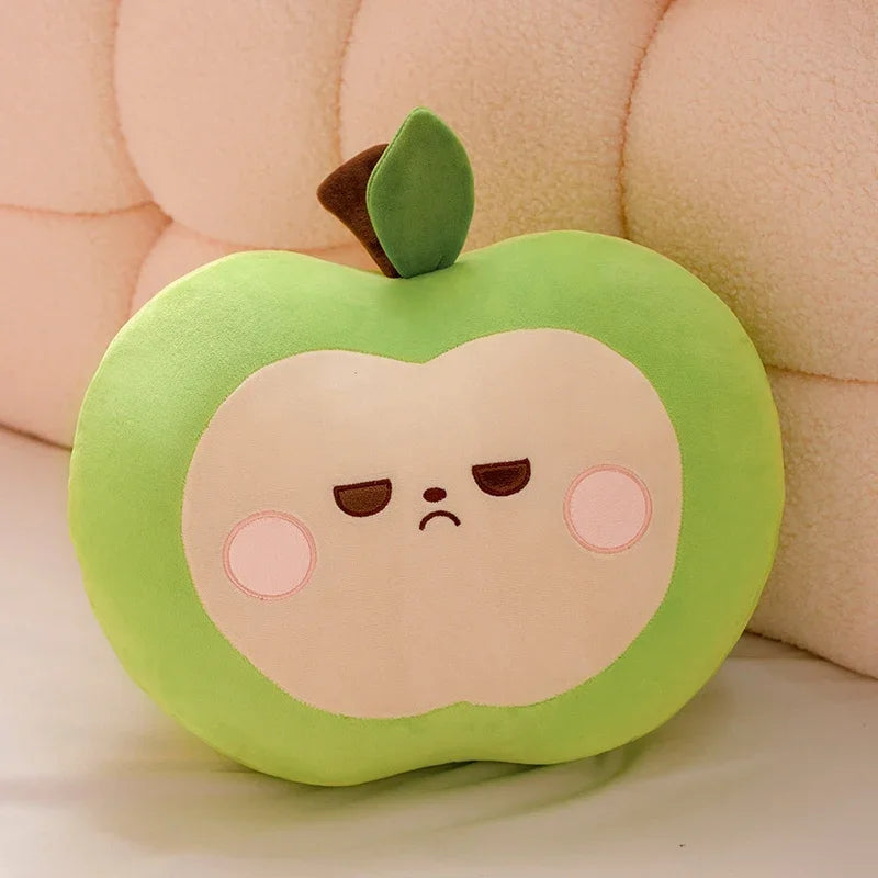 Plush toy shaped like a green apple with a unimpressed face on a beige background