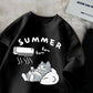 Black t shirt with a graphic of a cat relaxing under an air conditioner and text 'Summer fu~fu~' on a textured surface.