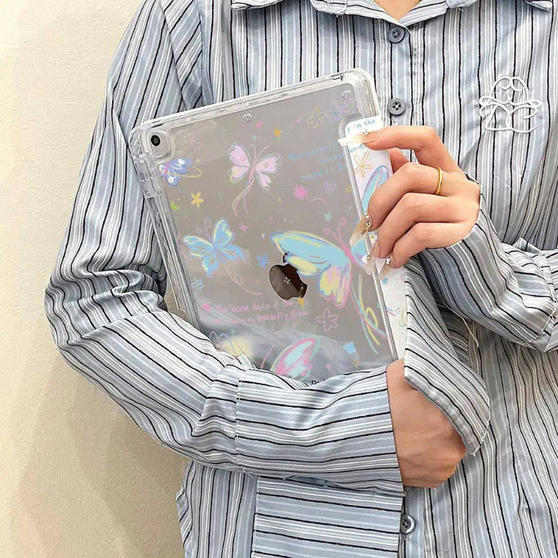 Person holding a clear ipad case with butterfly designs on the ipad case