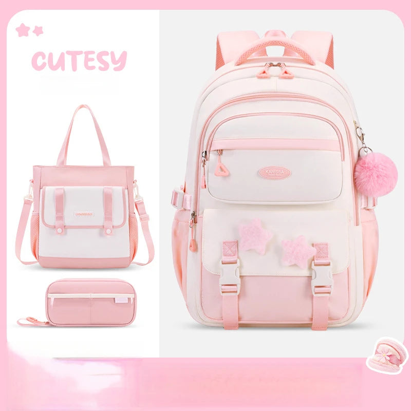Set of pink and white bags with 'CUTESY' branding on a pink gradient background