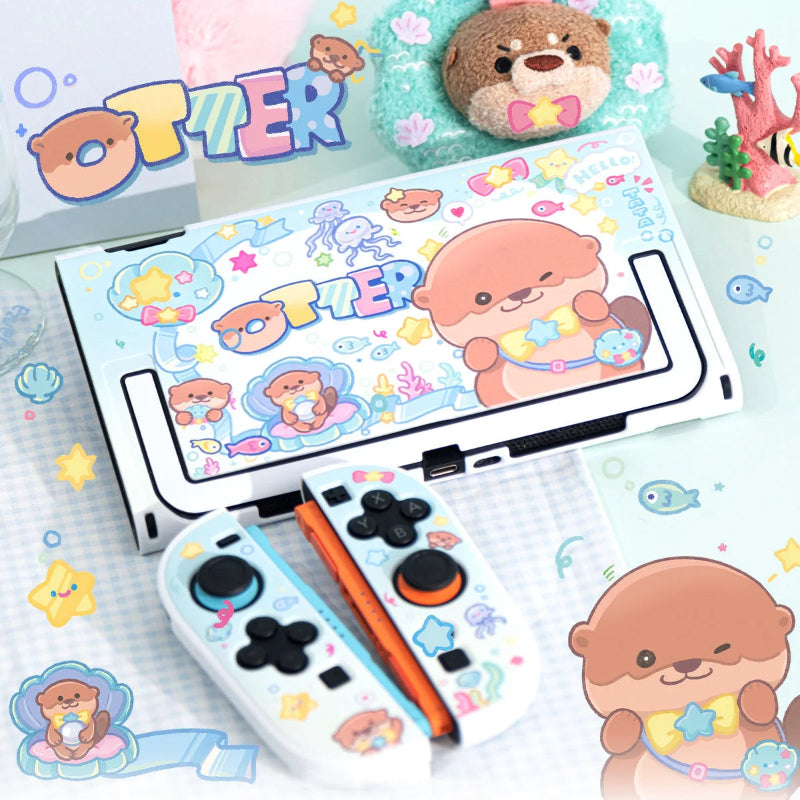 Colorful electronic device with cartoon characters and 'OTTER' branding on a decorative surface.