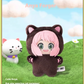 Plush toy of a character with cat ears and paws, standing on grass with a blue sky background.
