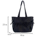 Black tote bag with measurements on a white background
