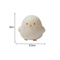 Small chick-shaped light with dimensions on a white background
