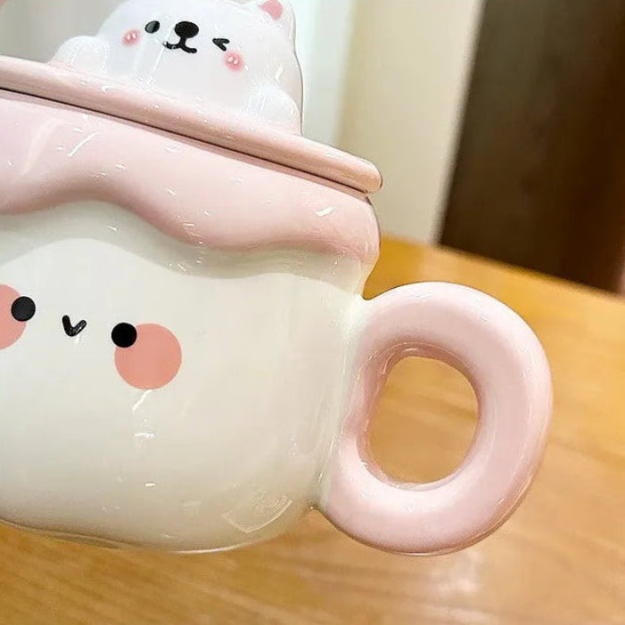 Kawaii Animal Pudding Ceramic Mug  in white and pink on a countertop 