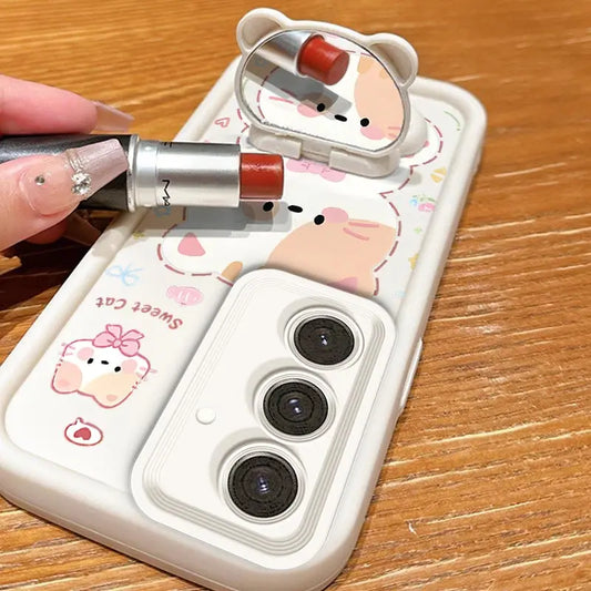 A woman is holding the Kawaii Cuties Samsung Phone Case, showing a closer view of the design of the case which features a sweet cat and a bear as a phone stand, which also includes the mirror when you position its head a certain way.