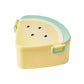 Yellow fruit-shaped container with green lid on a white background