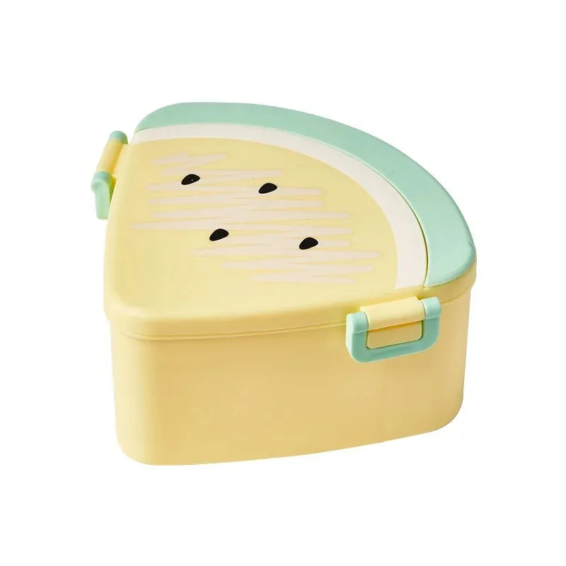 Yellow fruit-shaped container with green lid on a white background