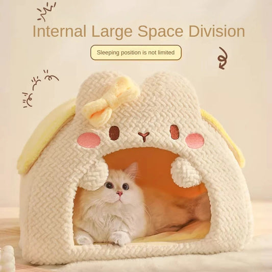 Cat inside a cute pet house with a bow, on a light background
