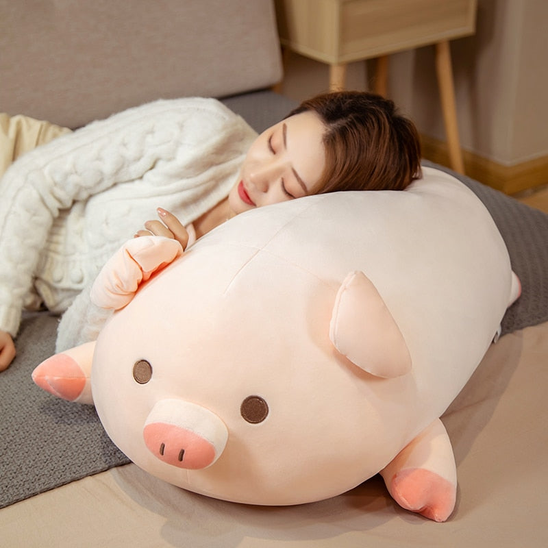 Model Using Our Kawaii Squishy Pig Plushie as a Pillow