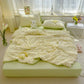 Green seersucker duvet set displayed on bed.