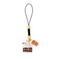 A Japanese lucky cat charm keychain featuring a white and black enameled lucky cat, a gold-plated bell, and a red and gold hanging tag with Japanese characters, attached to a black cord with gold spacer beads.