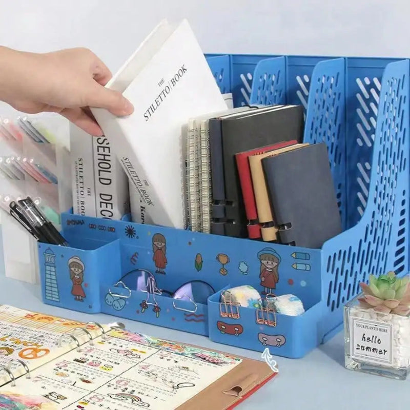Blue desk organizer with stationery items on a light blue surface
