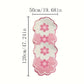 Pink and white floral bath mat shown with dimension lines indicating a height of 120cm (47.24in) and a width of 50cm (19.