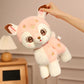 kawaii pink deer plushie being held by its ear.