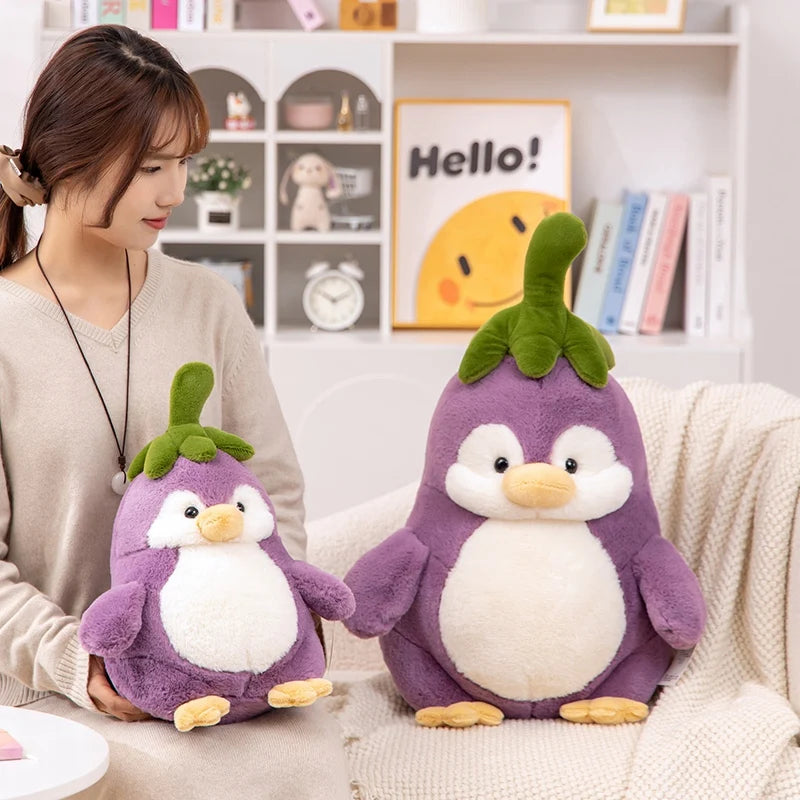  Kawaii Cute Penguin Eggplant Plushies with a woman