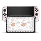 Nintendo Switch with a decorative case featuring kawaii characters on a white background