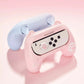Pink and blue gaming controller with cat ears on a pink background
