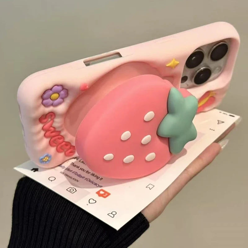 Side and back view of Kawaii Sweet Strawberry Butterfly iPhone Case held by a woman