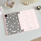 Kawaii tablet case with rabbit patterns on a light surface
