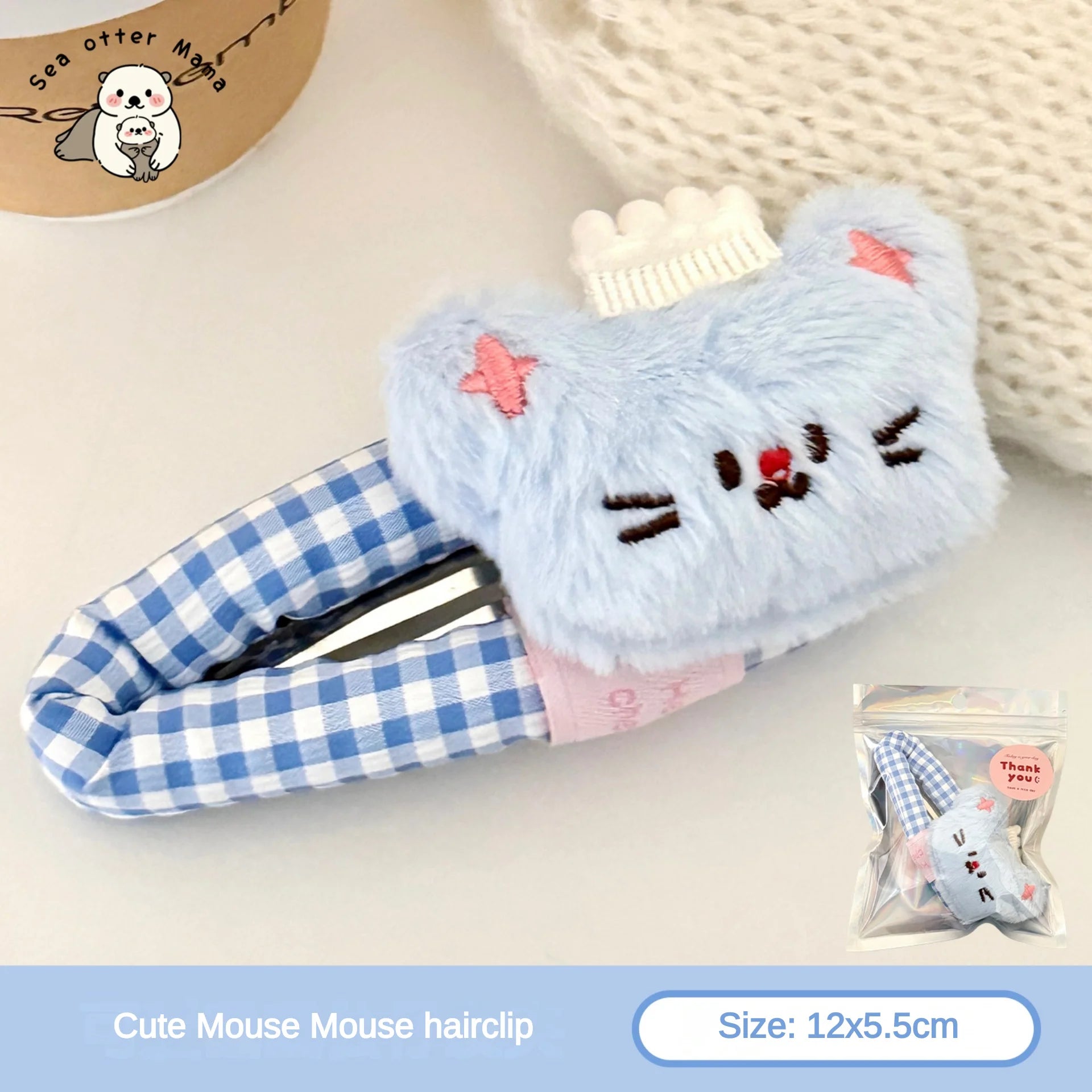 Cute mouse-shaped hair clip with checkered pattern on a light background