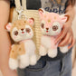 Two plush kawaii deer keychains