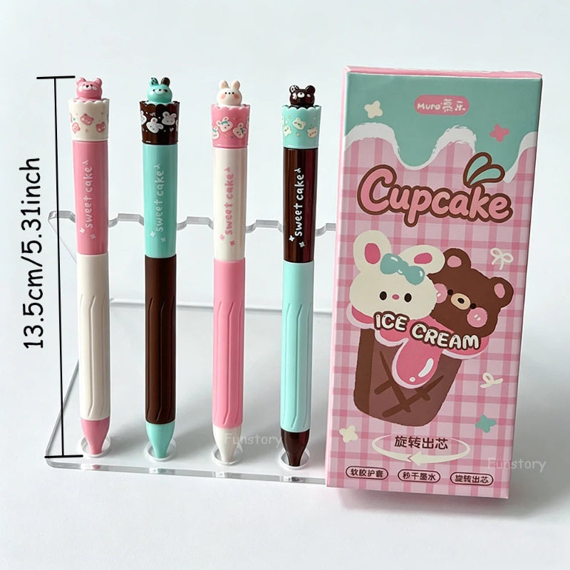 Set of four kawaii-themed pens with a packaging box on a white background