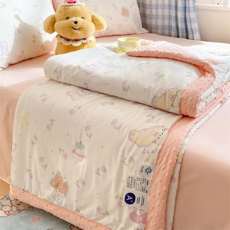 Kawaii Spring Quilts, the set being shown is the Cute Tulip Design with Pink, displayed on a bed half open.