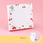 Kawaii sticky notes pad with cherry and bear design on a pink background