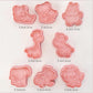 Set of animal-shaped cookie cutters with dimensions on a white background