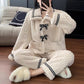 Kawaii Black & White Pajamas with woman taking selfie sitting on the ground