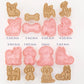 Set of dog-shaped cookie cutters with measurements on a white background
