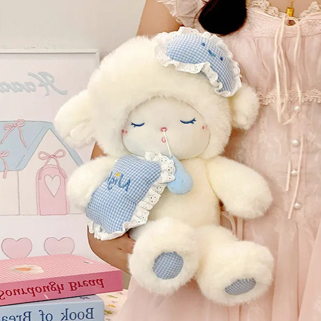 Person holding a lamb plushie