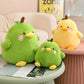 Front view of Kawaii  Cute Duck Peak Plushies in green and yellow on a sitting area  