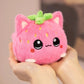 Front view of  Kawaii Strawberry Cat Plushie held by a woman