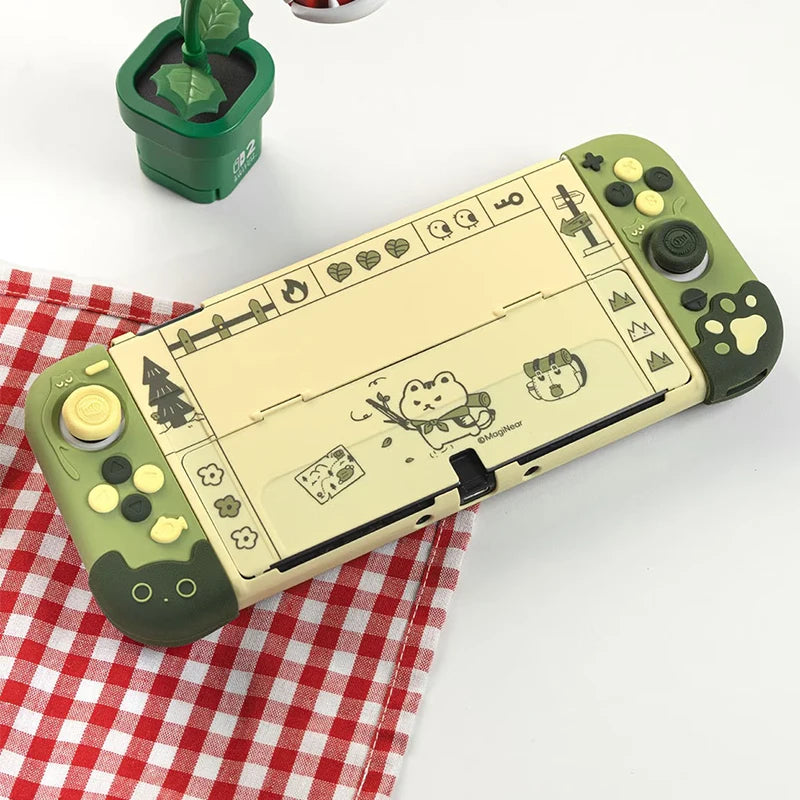 Green and beige phone case with cartoon designs on a white surface with a red checkered cloth.