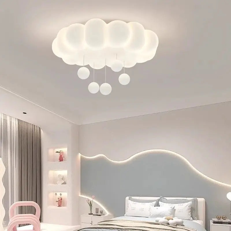 Modern bedroom with cloud-shaped ceiling light fixture