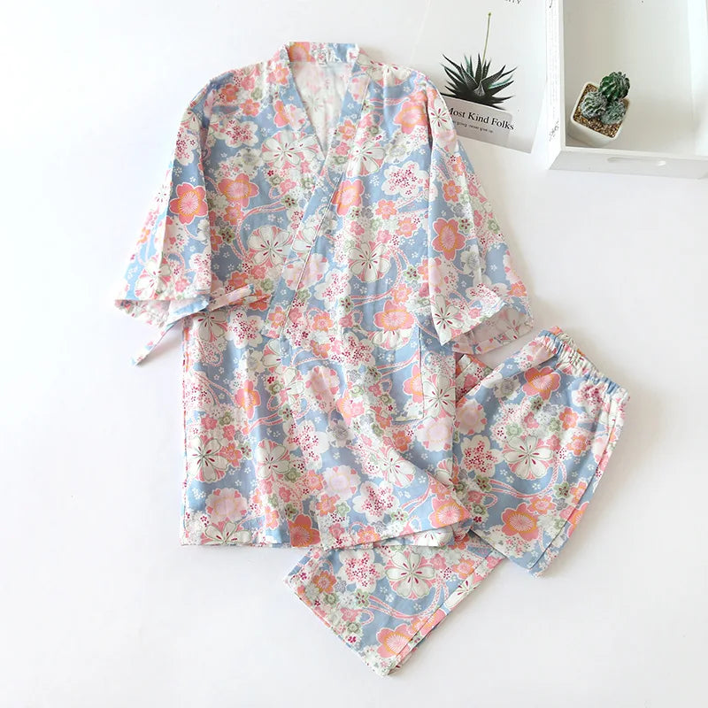 Floral pajama set on a white surface with a minimal background