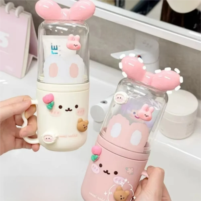 Two cute, kawaii style bottles with animal designs held by a hand.