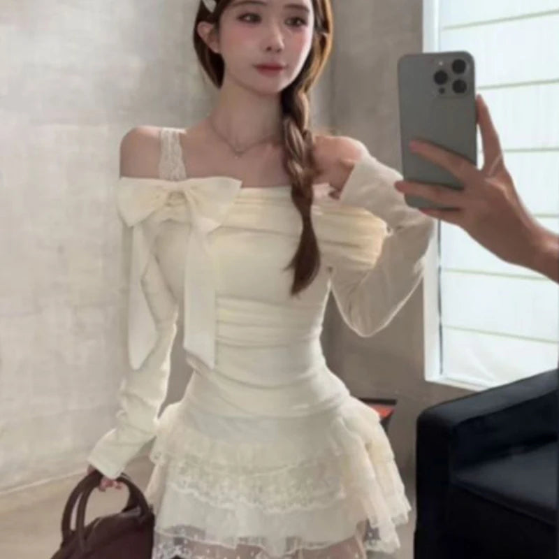 Girl  her hair in a braid wearing a white off shoulder shirt and lacy skirt and holding a brown purse.