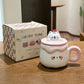 Pink and White Kawaii Animal Pudding Ceramic Mug sitting on a countertop 