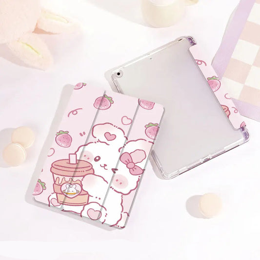 kawaii Strawberry Bunny & Coffee iPad Case, this case depicts a bunny winking while holding a coffee in its paws, with strawberries raining down, the main color is pastel pink with a white rabbit. this case is displayed on a white desk top.