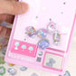 Pastel-colored stickers on a pink colorful background