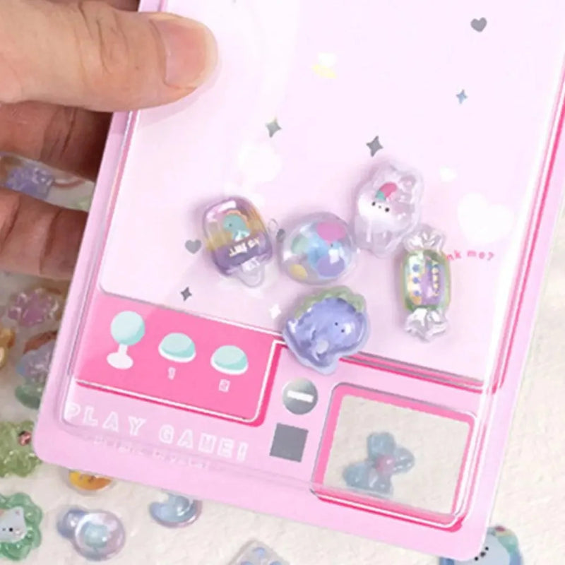 Pastel-colored stickers on a pink colorful background