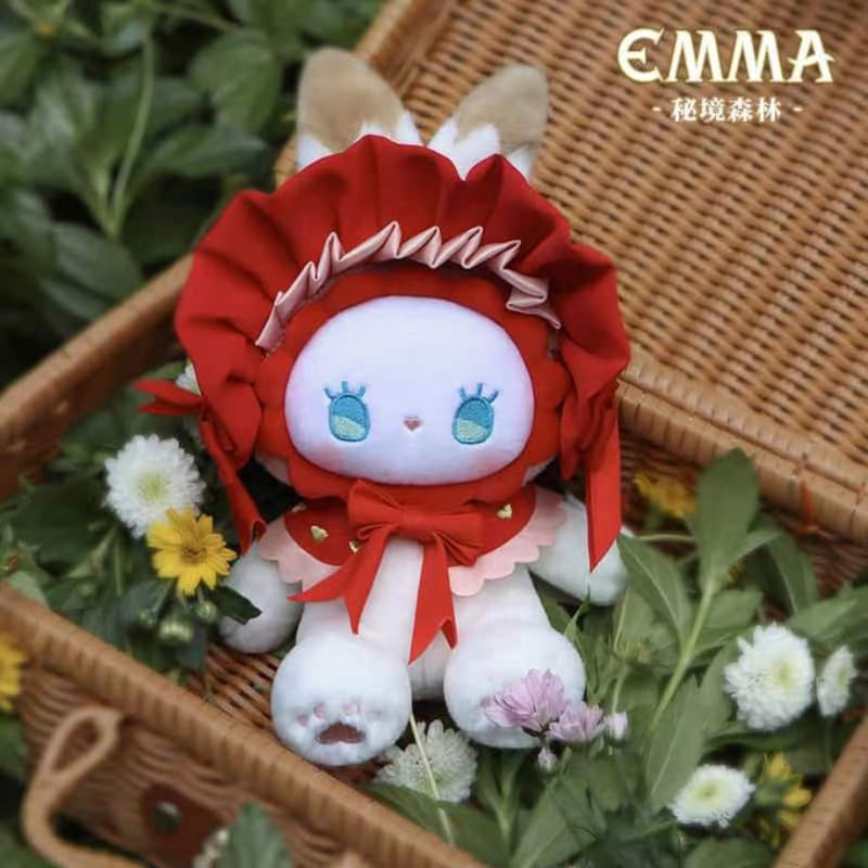 Strawberry Red Emma Plush Keychain displayed in a picnic basket