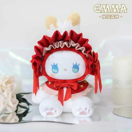 Strawberry Red Emma Plush Keychain, displayed on a glass table