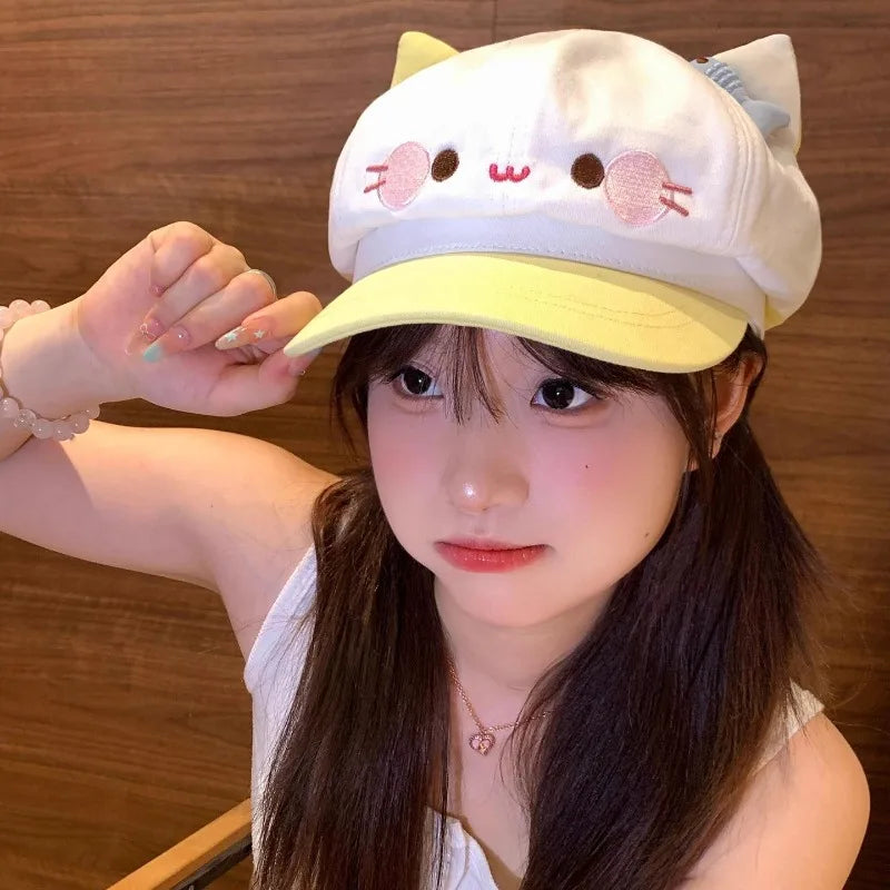 Person wearing a cute cat-themed cap with a wooden background