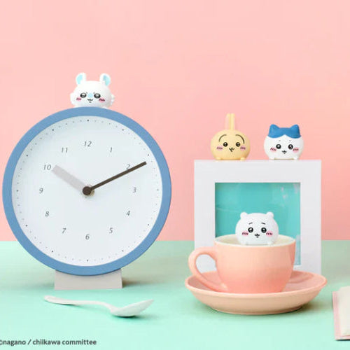 HIPPERS CHiiKAWA Blind Box, this image is displaying all the cute figures you could get out of one of the blind boxes!, on a pink and blue background