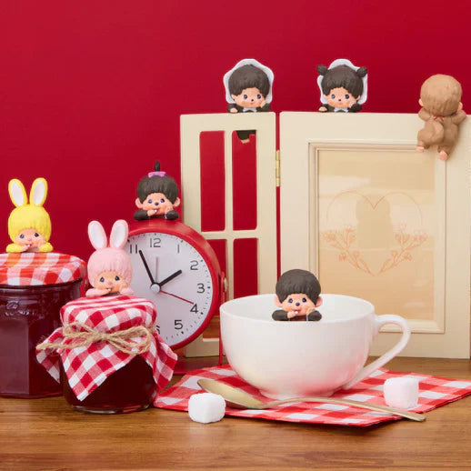 Miniature figures and items on a wooden surface with a red background